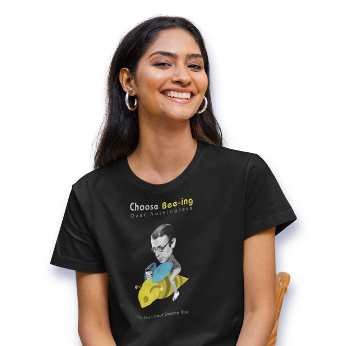 Young lady smiling and wearing our Bee-ing Over Nothingness shirt
